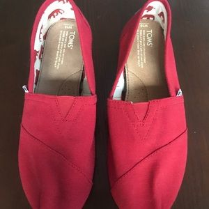Brand new RED Toms - size 10